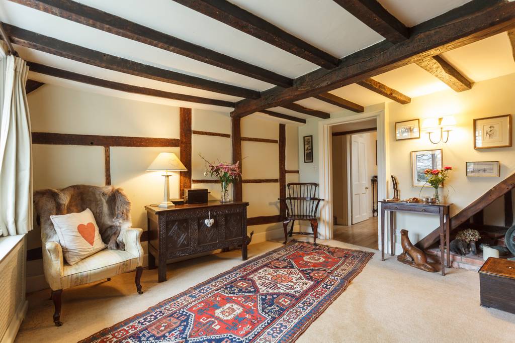 Entrance hallway with exposed timber frame